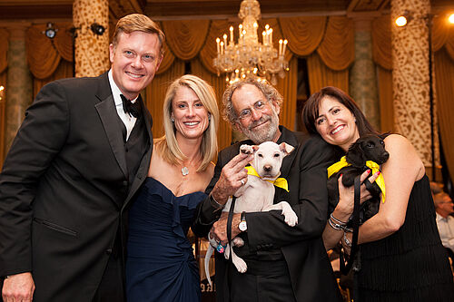 2014 Fur Ball Co Chairs Jake Stephanie Henry and Murray Anne Marie Peretz with homeless dog Photo by Sparenga Photograph